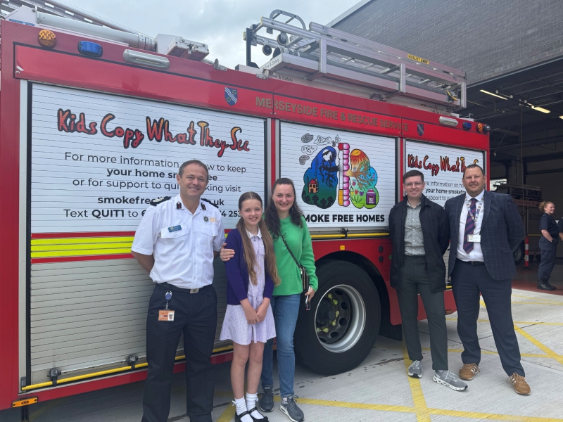 Fire Engine Drives Home Children’s Plea  for No Smoking Indoors 