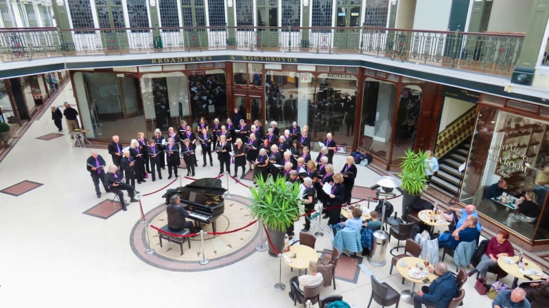SingMe Merseyside Choir serenade shoppers as they raise funds for Queenscourt Hospice