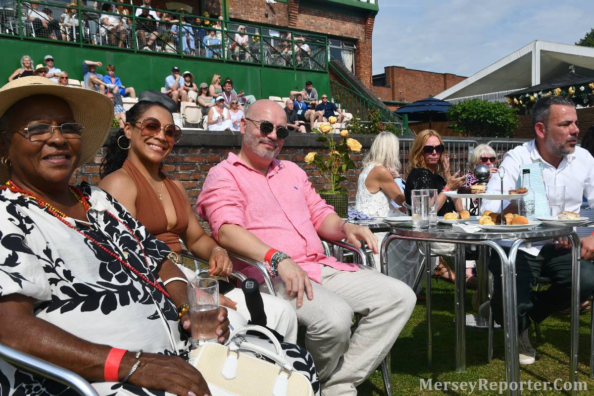 People sat down at the Liverpool International Tennis Tournament.