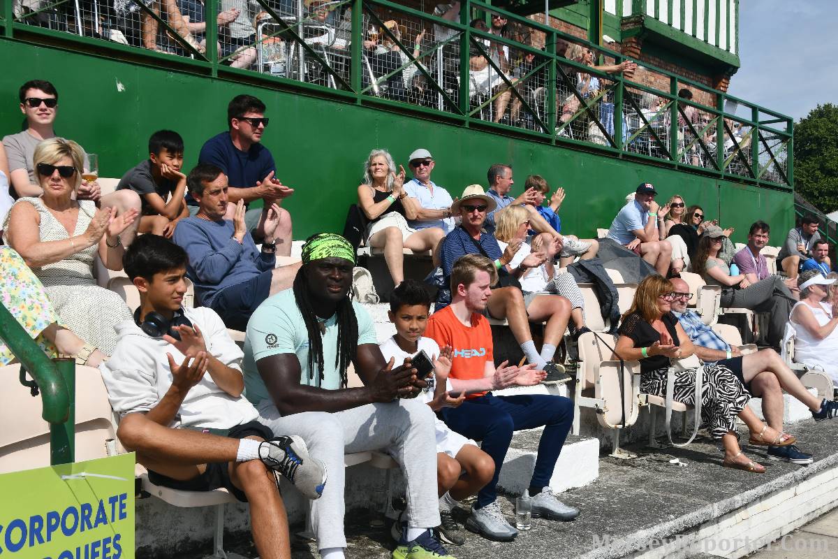 People sat down at the Liverpool International Tennis Tournament.