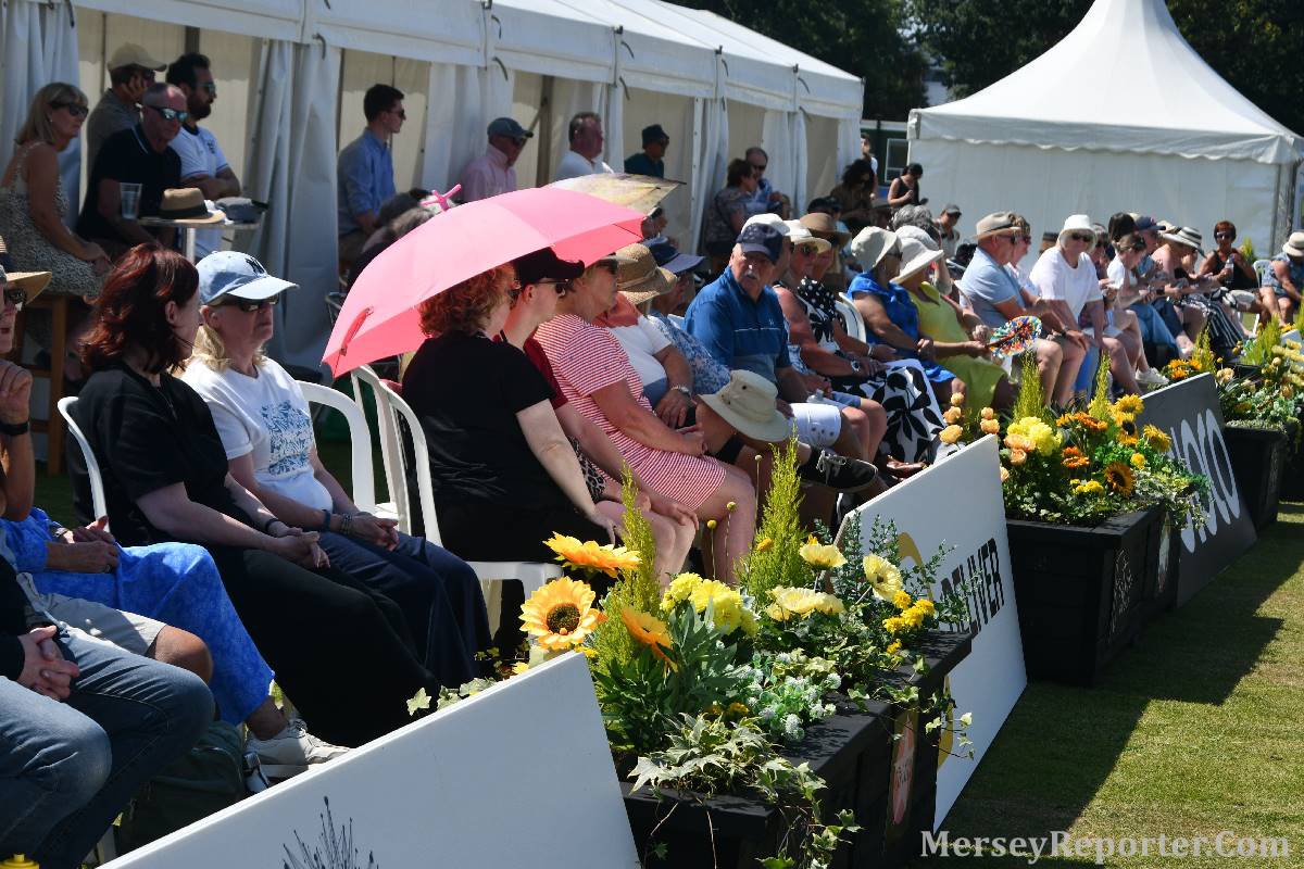 People sat down at the Liverpool International Tennis Tournament.